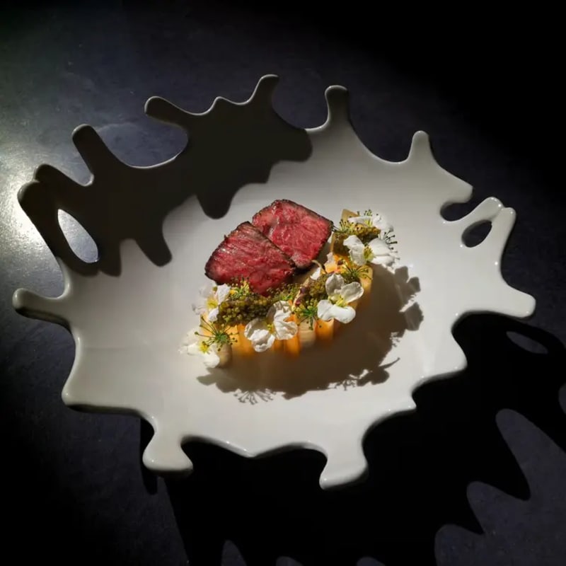 These modern kitchens highlight culinary creativity, local ingredients, and polished plating.