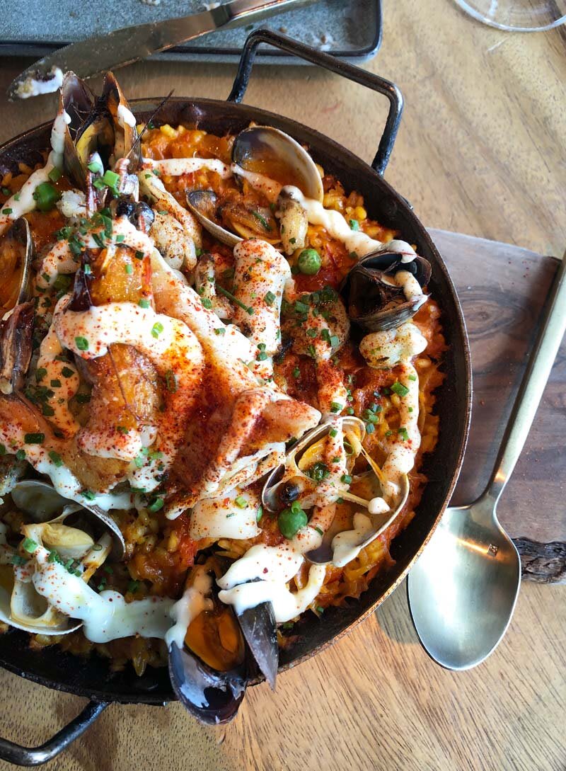 Saffron-scented rice, seafood, and sizzling skillets—find Denver’s most flavorful paella at these standout spots.