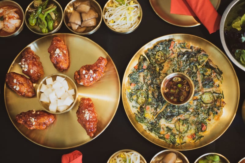 Bold BBQ, bubbling stews, and banchan spreads—these are Denver’s Korean must-tries.