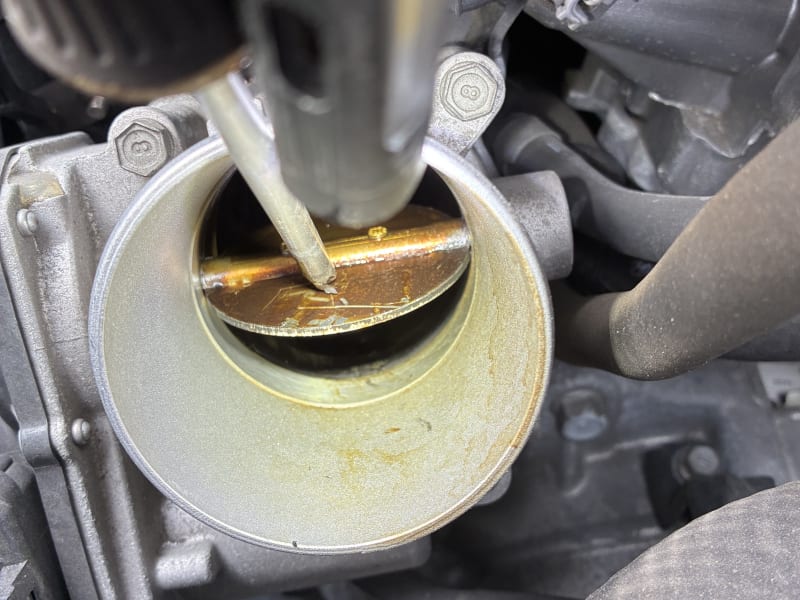 Throttle body cleaning during an engine service