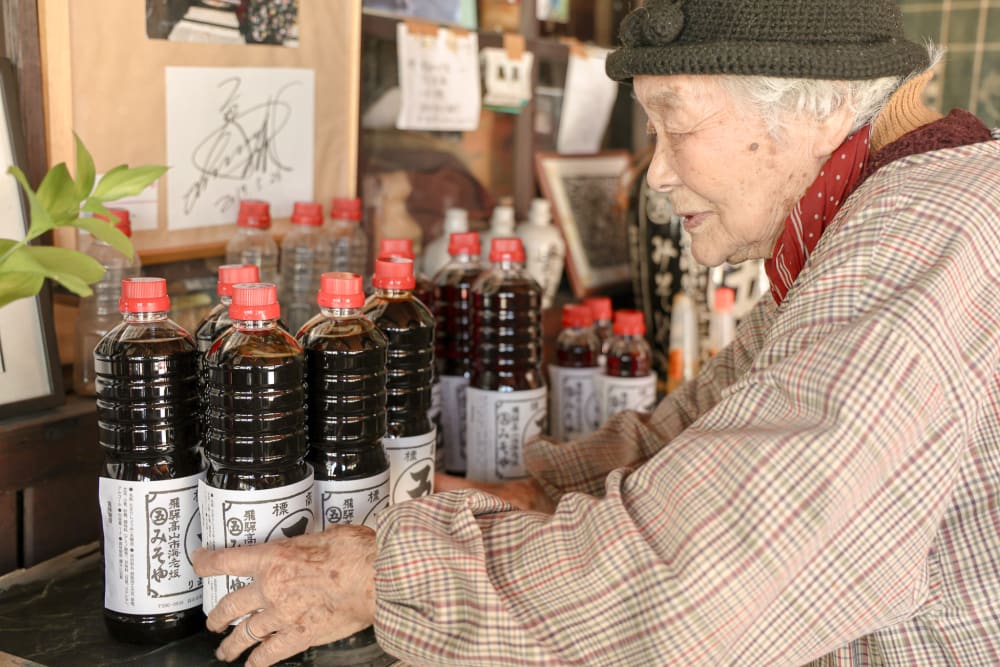 Hida Takayama street food served over the counter of a small shop