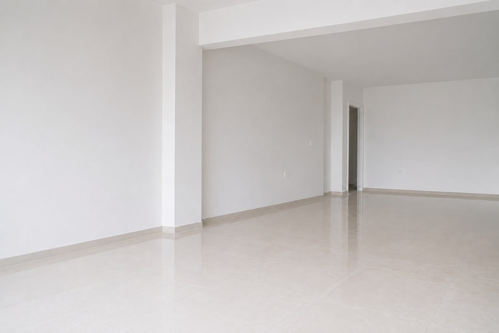 Cluttered living room before renovation