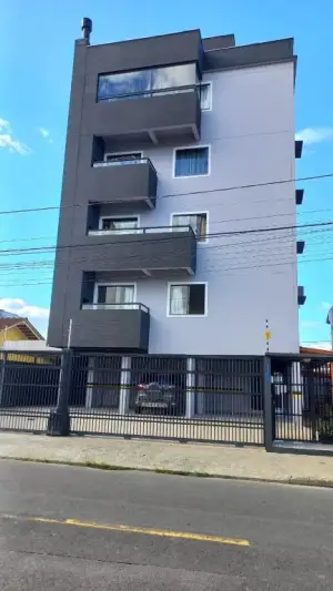 Apartamento semimobiliado para locação em Joinville Comasa com suíte e churrasqueira