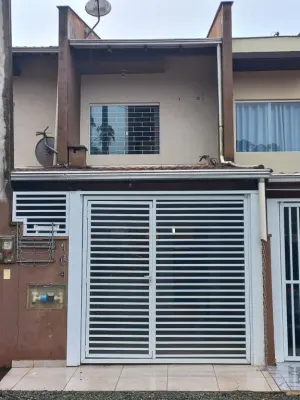 Sobrado geminado para locação em Joinville Paranaguamirim com 2 dormitórios e sacada