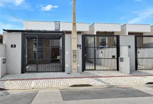Casa geminada nova com 1 suíte + 1 dormitório, para locação no Comasa, em Joinville!