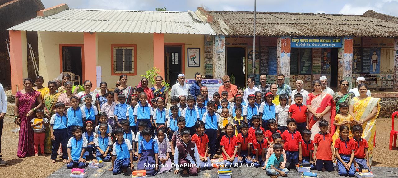 Raincoats, Umbrellas & Stationery Distributed to 250 Students in Pune