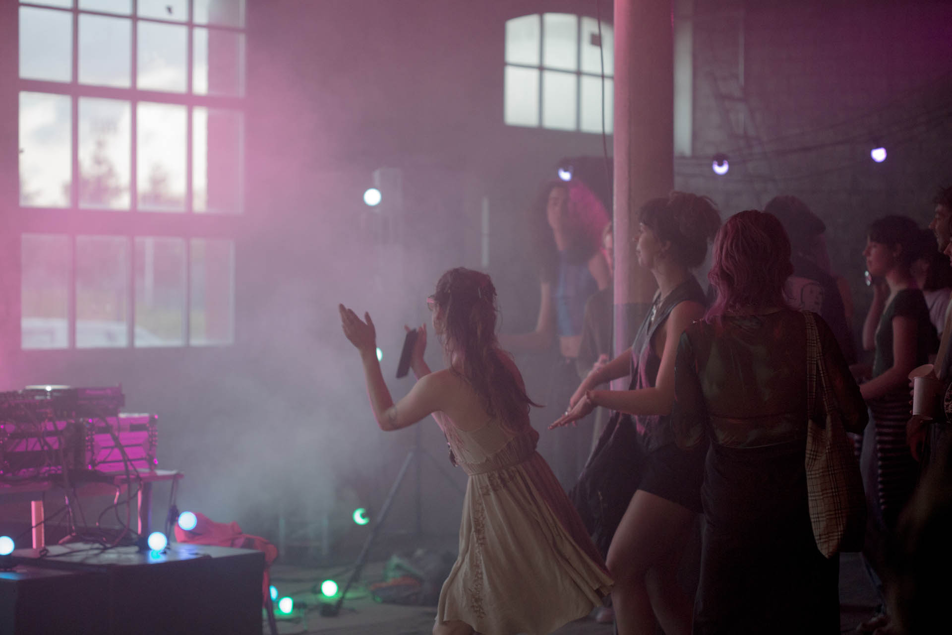 Crowd cheering at a club night event