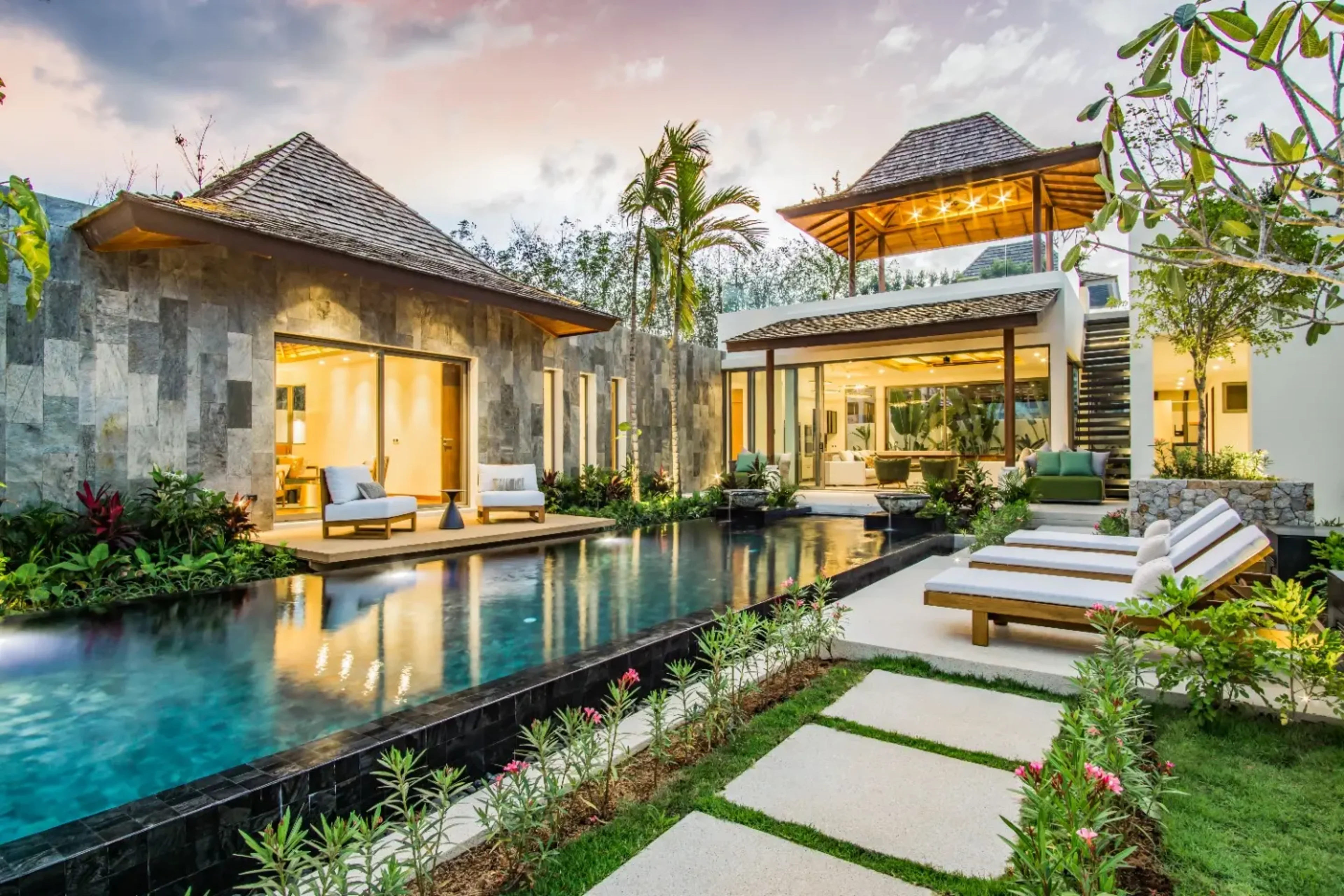 Contemporary pool villa in lush greenery