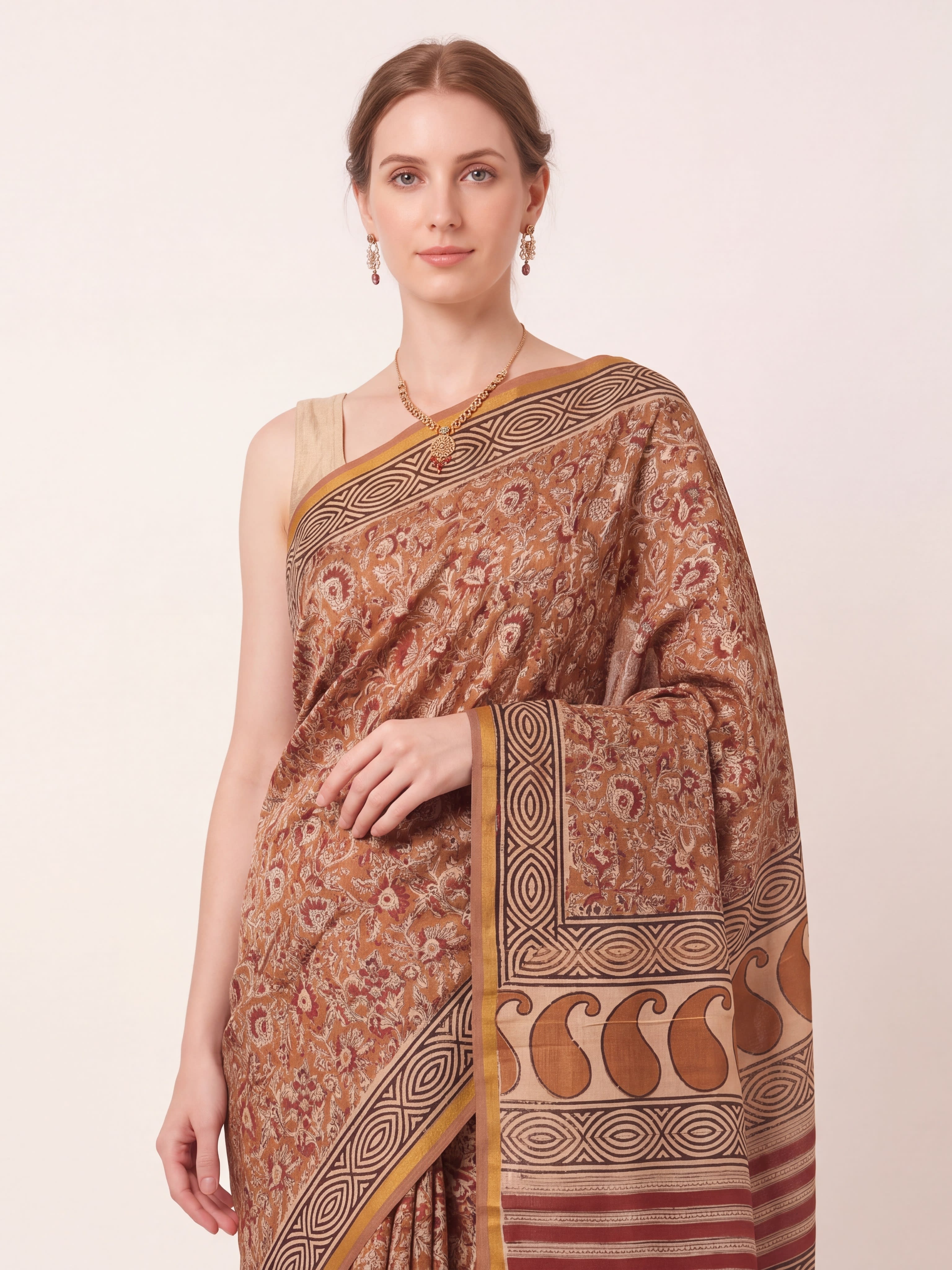 Earthy Brown Pen Kalamkari Saree with Paisley & Geometric Block Pallu
