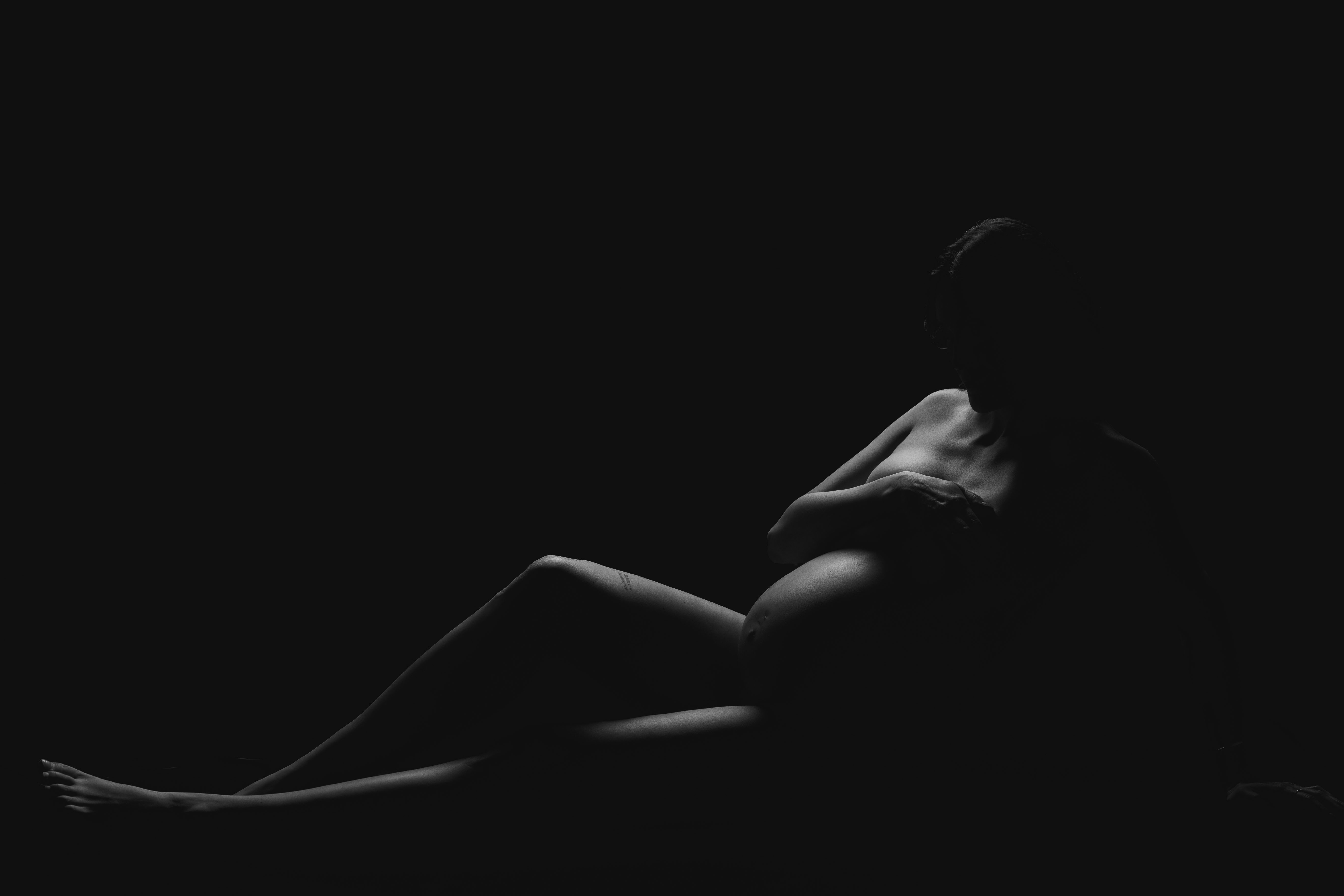 Fine art maternity photographer Okanagan — wide studio portrait with natural light