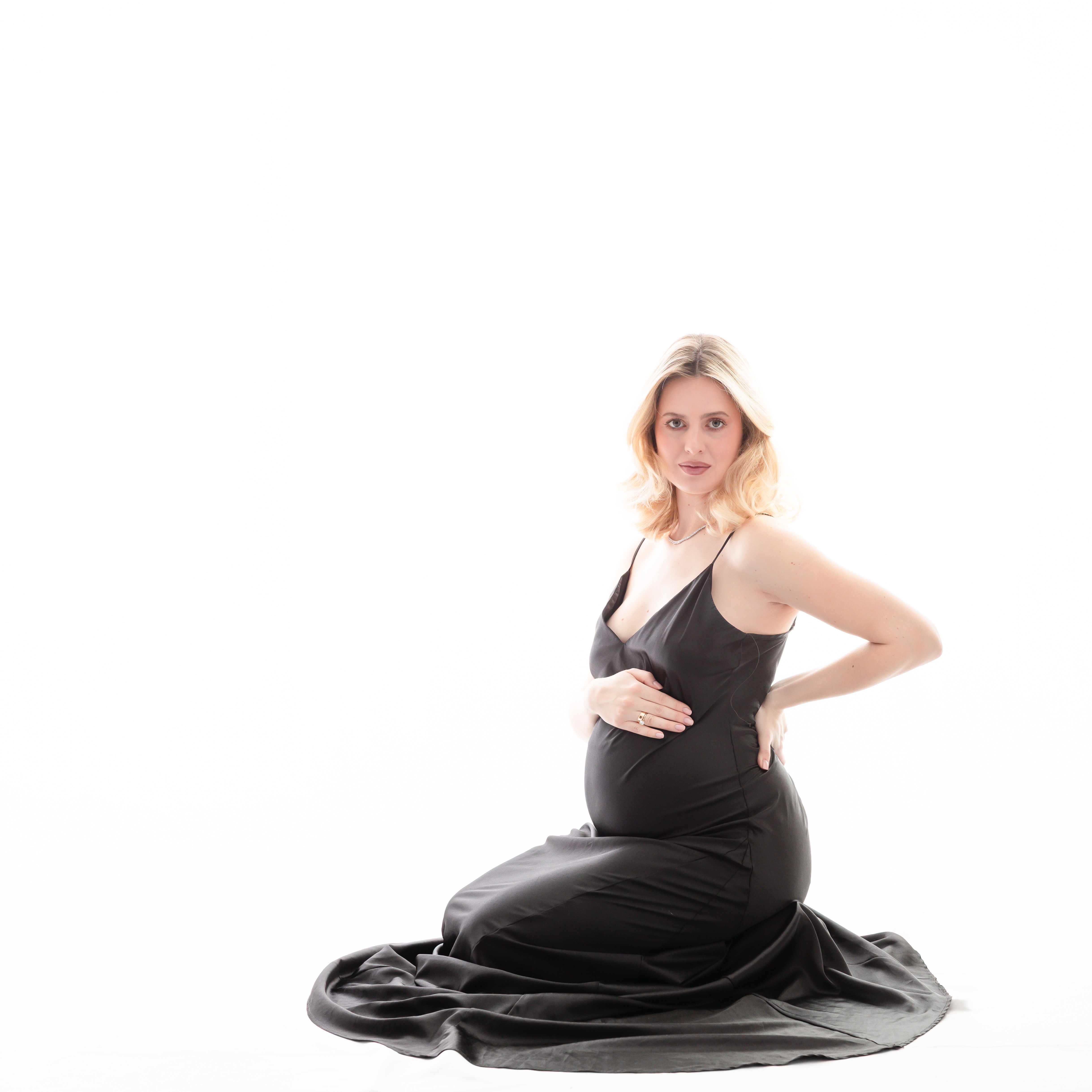 Fine art maternity photographer West Kelowna BC — serene studio session