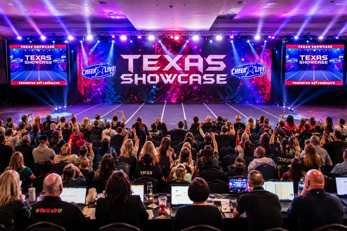 Texas Showcase stage with LED screens, lighting and a packed audience.