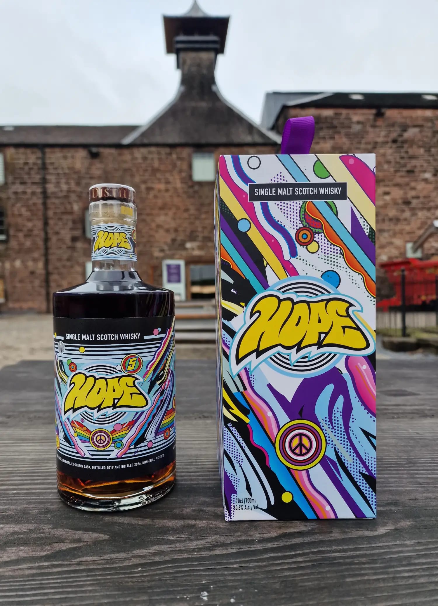 Whisky4Charity limited edition whisky bottle with colorful packaging