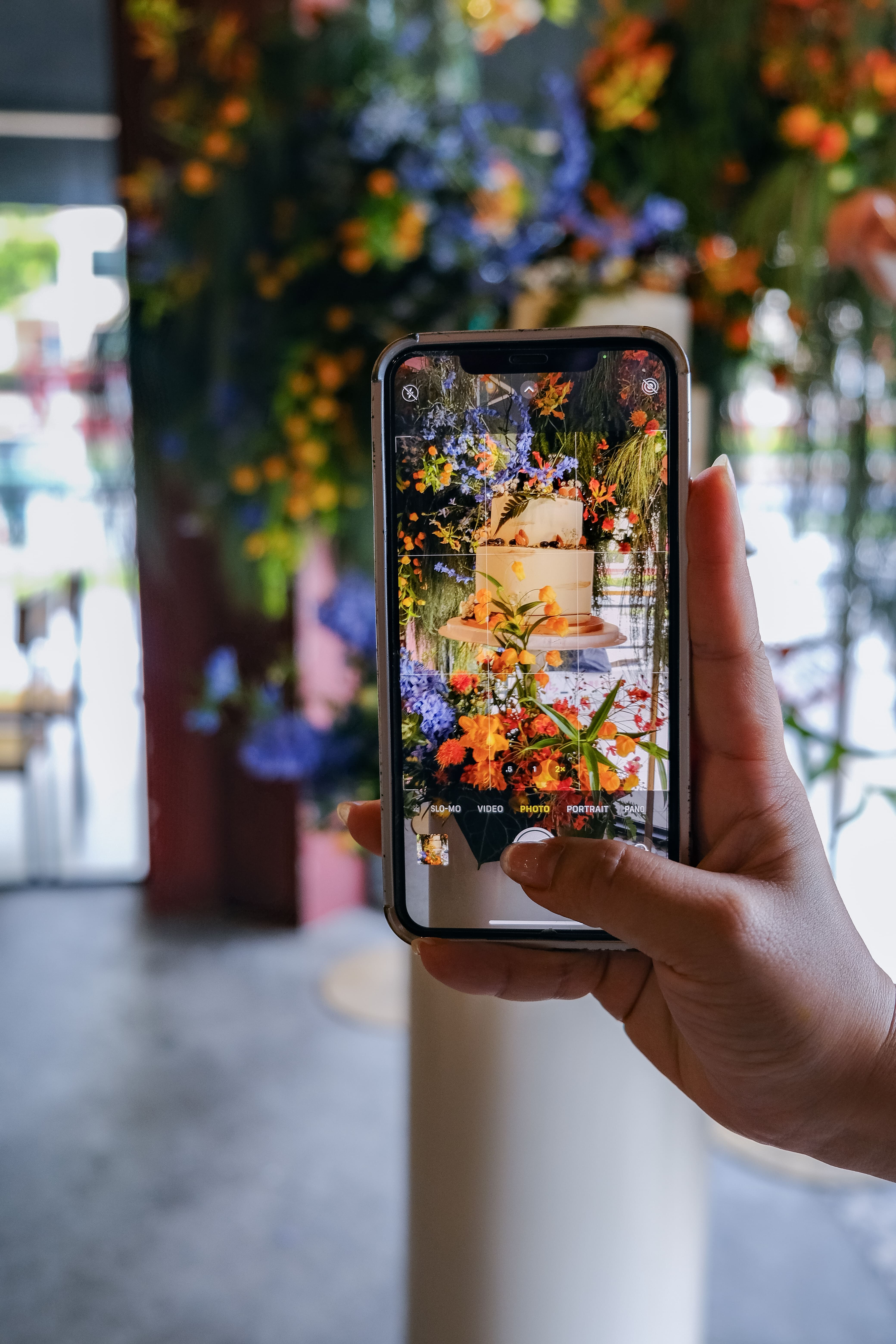 Phone photo being taken of the floral setup.
