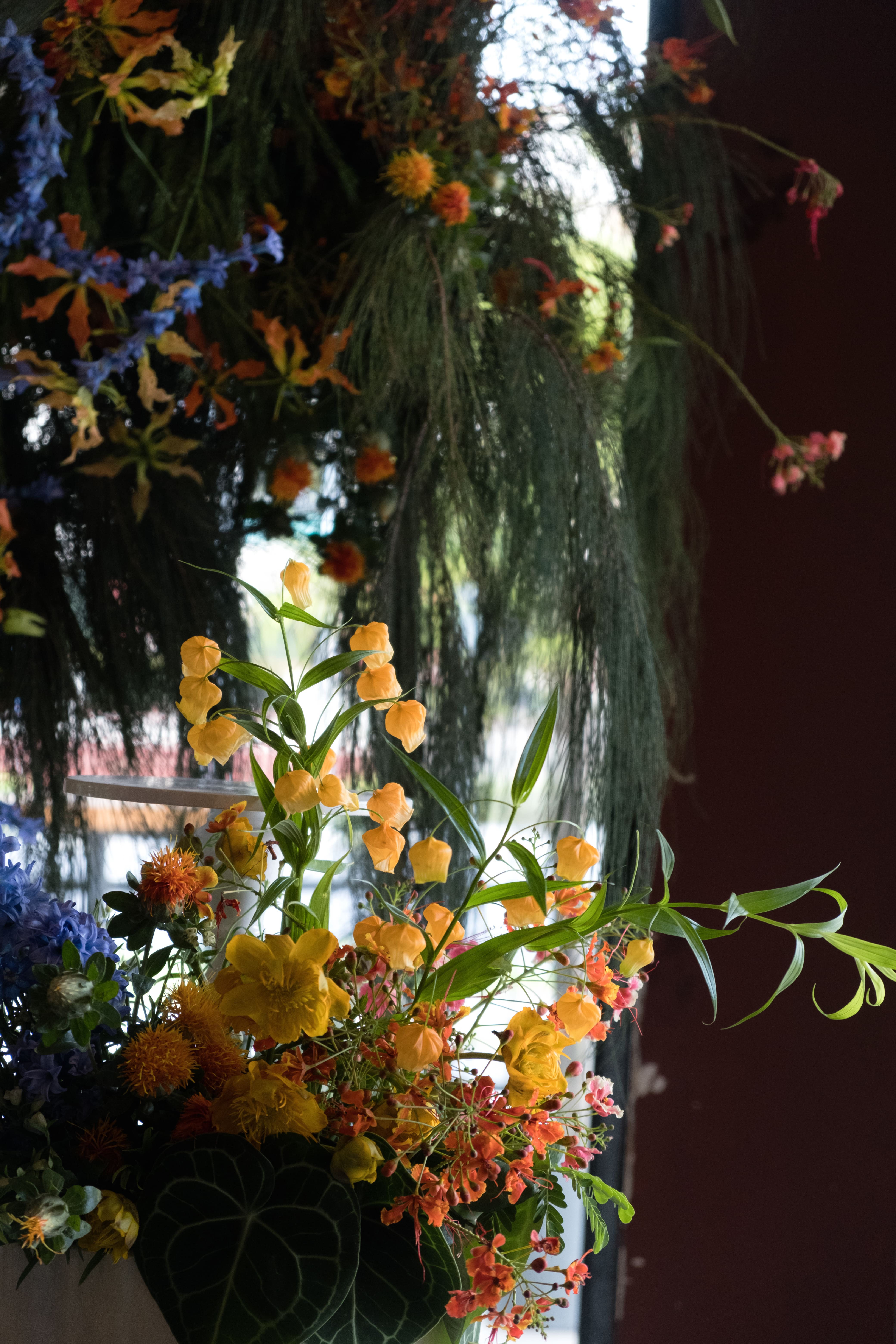 Cinematic of the hanging and pedestal floral.