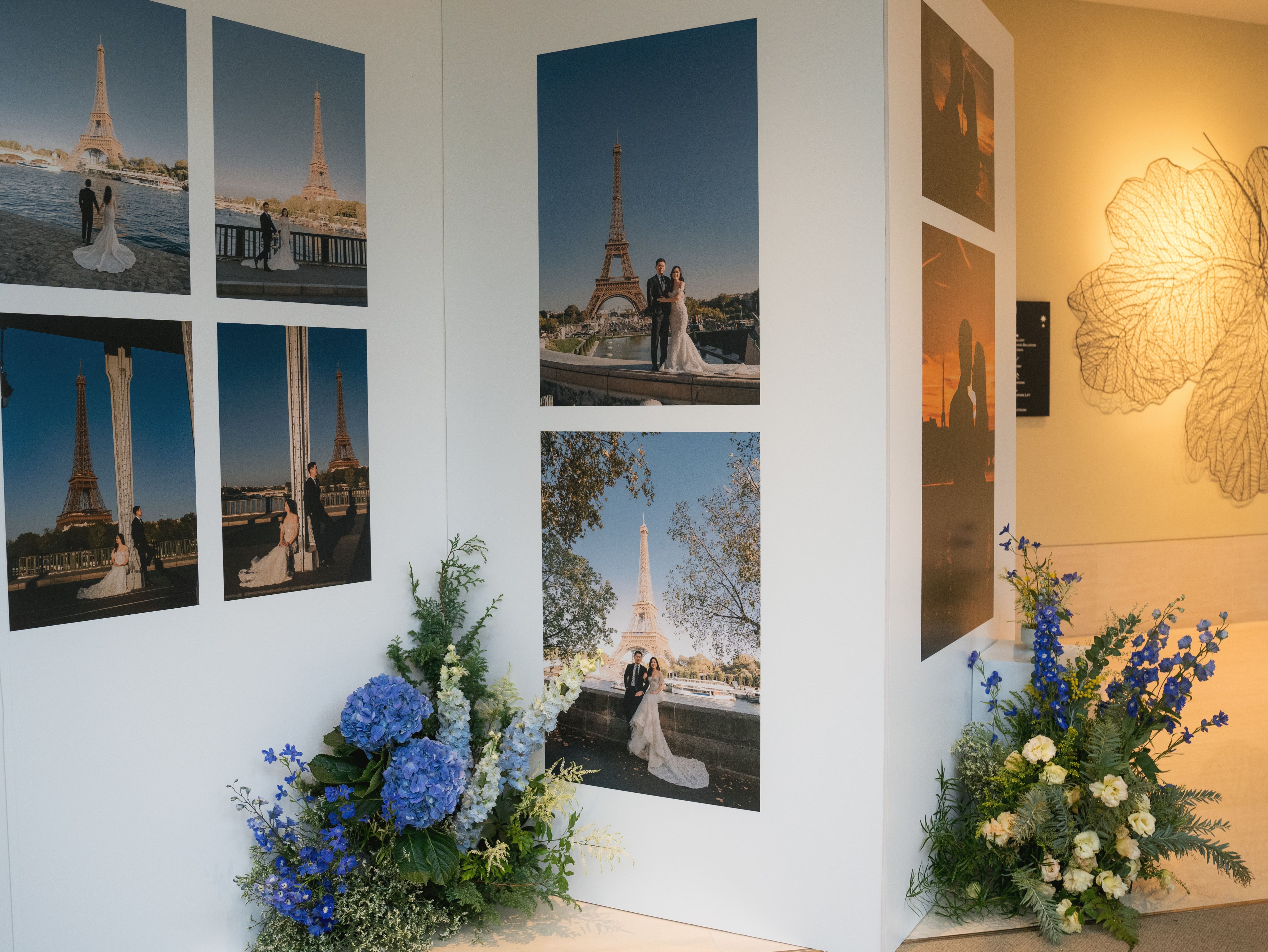 Travel-themed photo display with soft floral accents