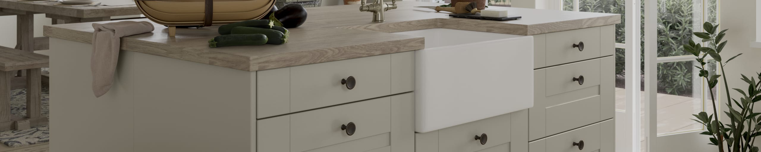 Winchester kitchen by Magnet. A wood grain effect affordable alternative to solid timber built from hardwearing MDF and available in 5 colours.