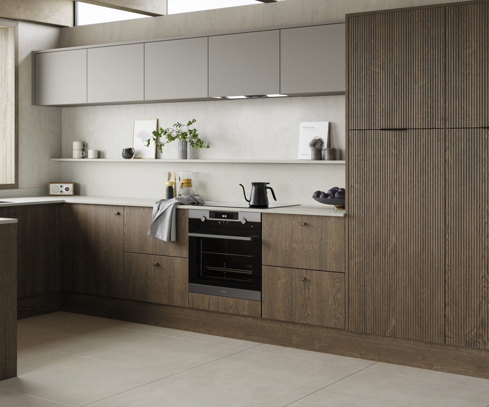 Magnet Kitchens 2021 Nordic Nature range with Fluted oak doors and Integra Hoxton Pebble cabinets with Dekton Aeri worktop. U-shaped kitchen with breakfast bar area.