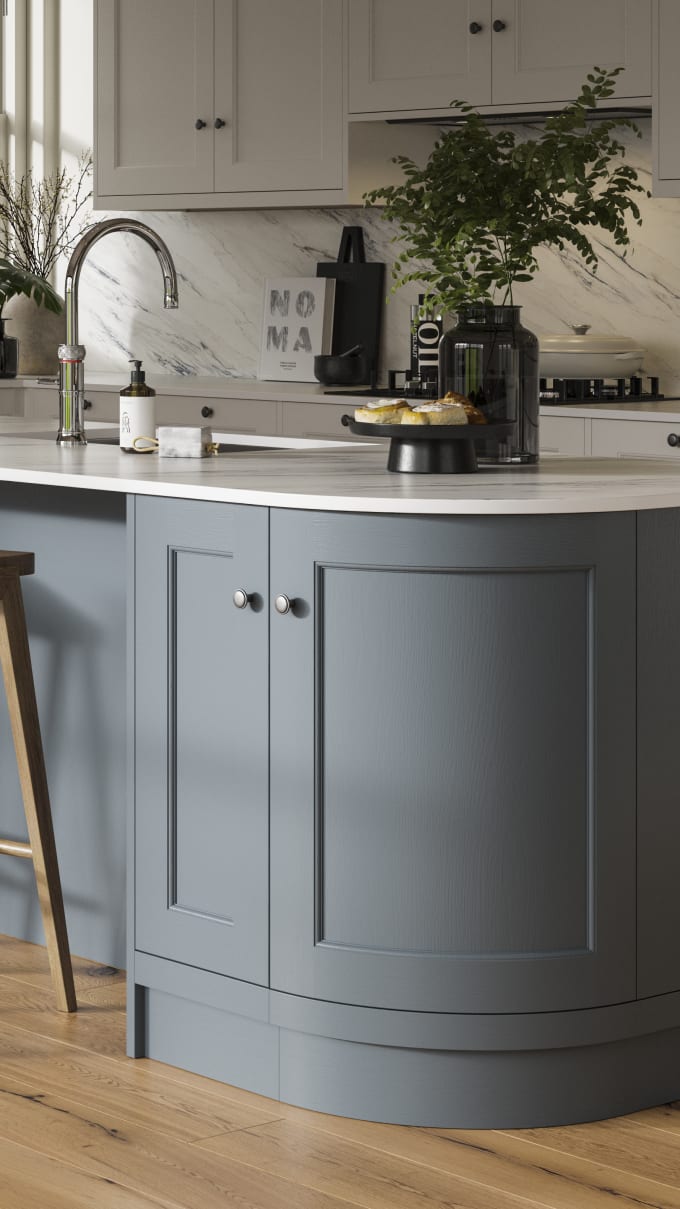 Traditional Shaker-style kitchen range featuring panelled doors with visible woodgrain and beading detail