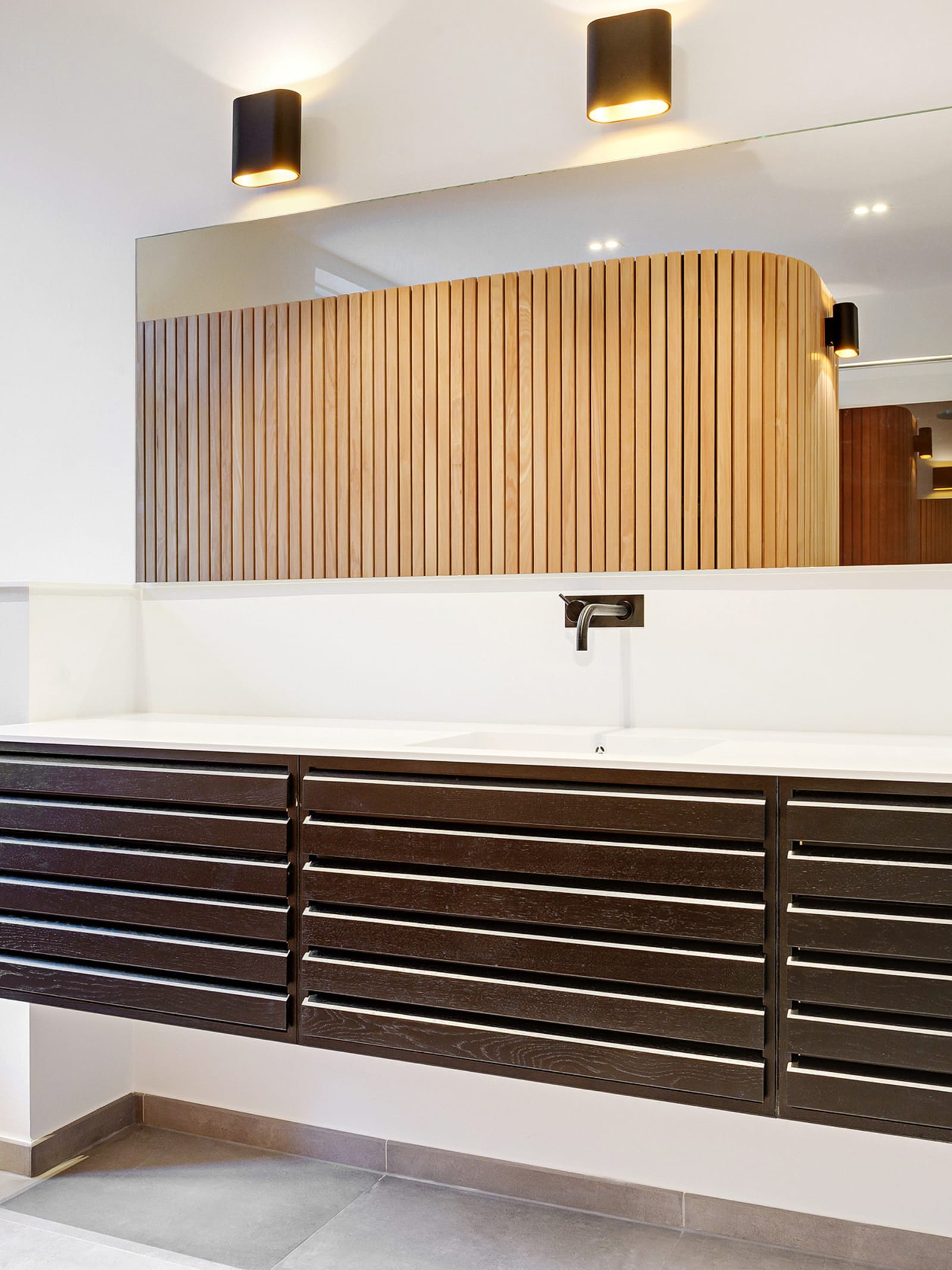 uno form luxury bathroom with bespoke cabinetry made from black oak