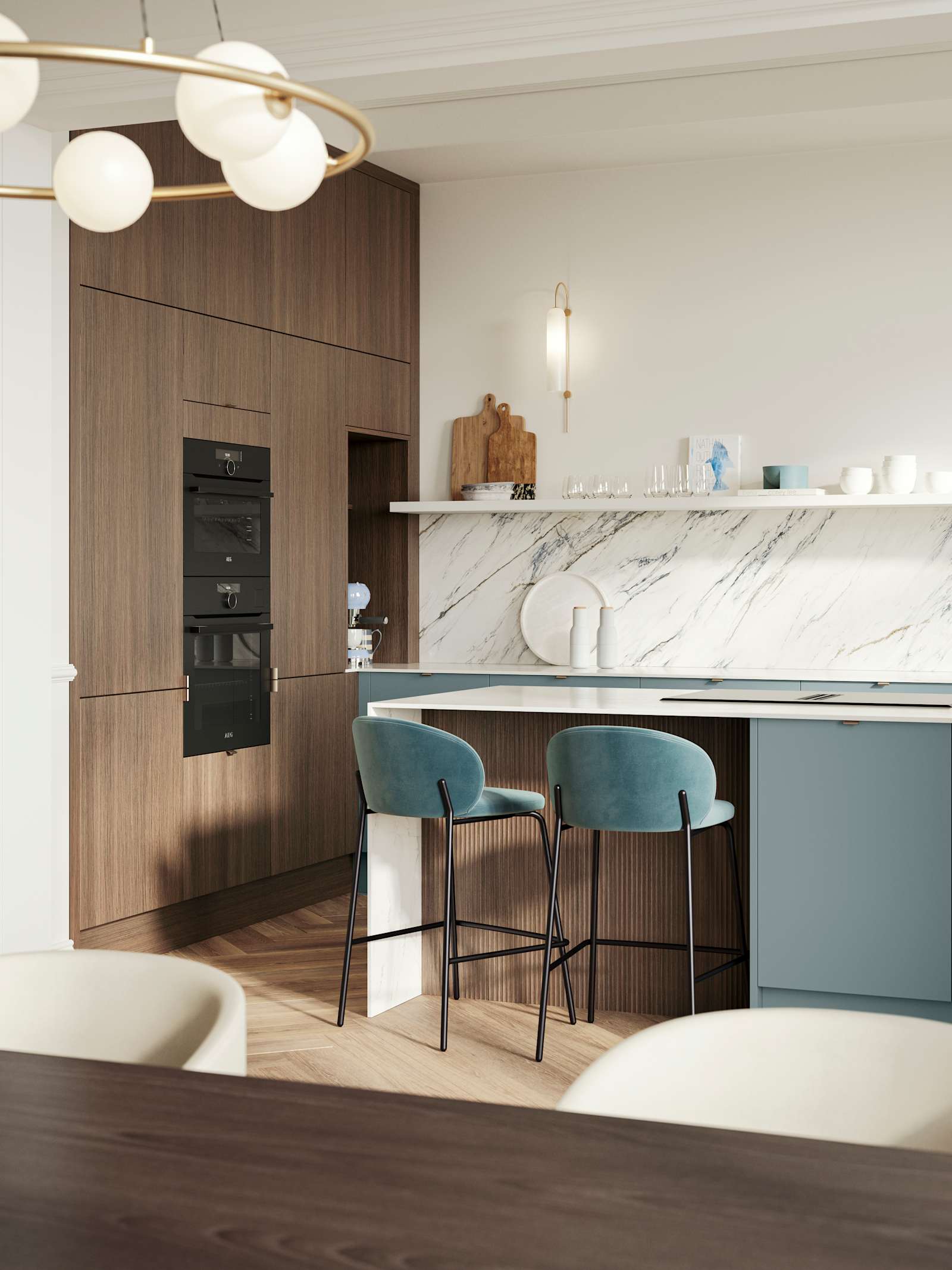 Soho Duck Blue kitchen from Magnet combined with ovens integrated into tall Nordic Nature cabinetry, white marble splashblack, paired beautifully with a bright brass tap and sink.