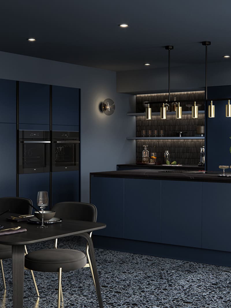 Integra Hoxton Kitchen from Magnet available in metallic midnight blue. Smooth slab doors and a painted effect finish.