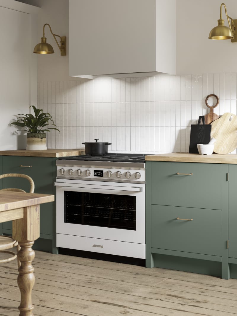 Soho Eucalyptus Green kitchen in charming contemporary cottage, a modern slab door with a painted rather than foil surface, for a truly premium look.