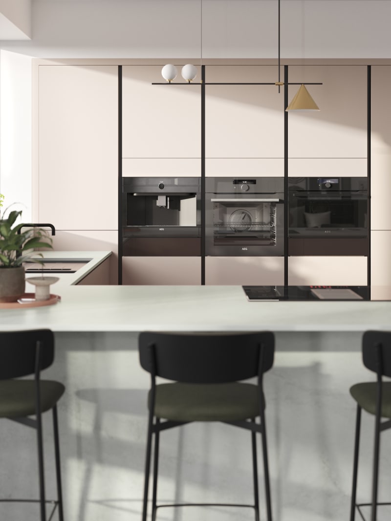 Integra Soho Rose bowl is a light pink frameless slab door with integrated handles in a smooth paint finish.