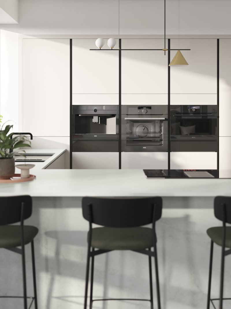 Integra Dove grey is a frameless slab door with integrated handles in a smooth paint finish.