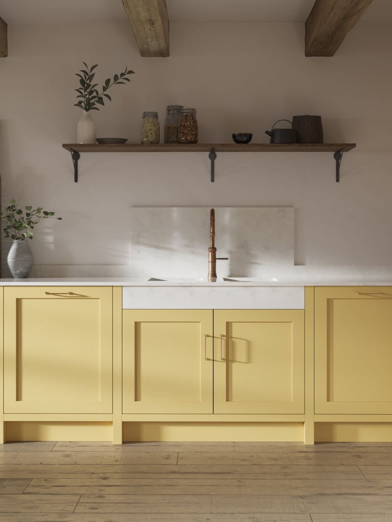 Shaker kitchen in the bright and beautiful yellow shade Harvest, paired with open wooden shelf and a marbled worktop.