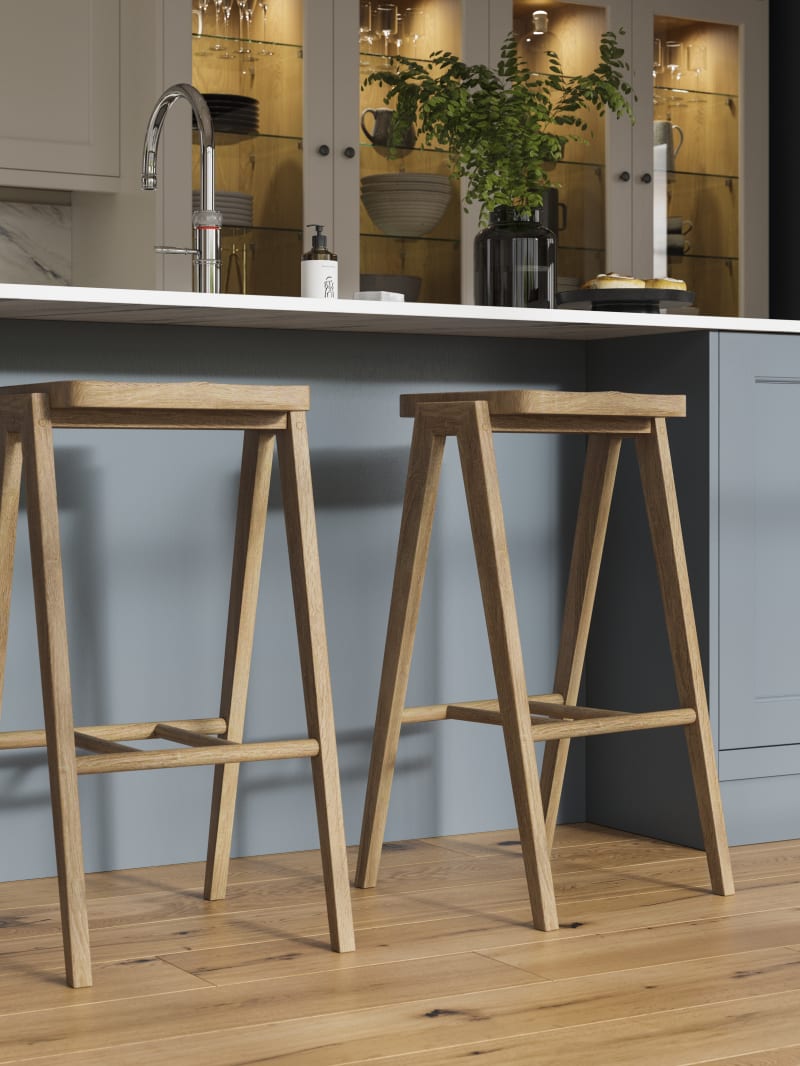 Traditional Shaker-style kitchen range featuring panelled doors with visible woodgrain and beading detail