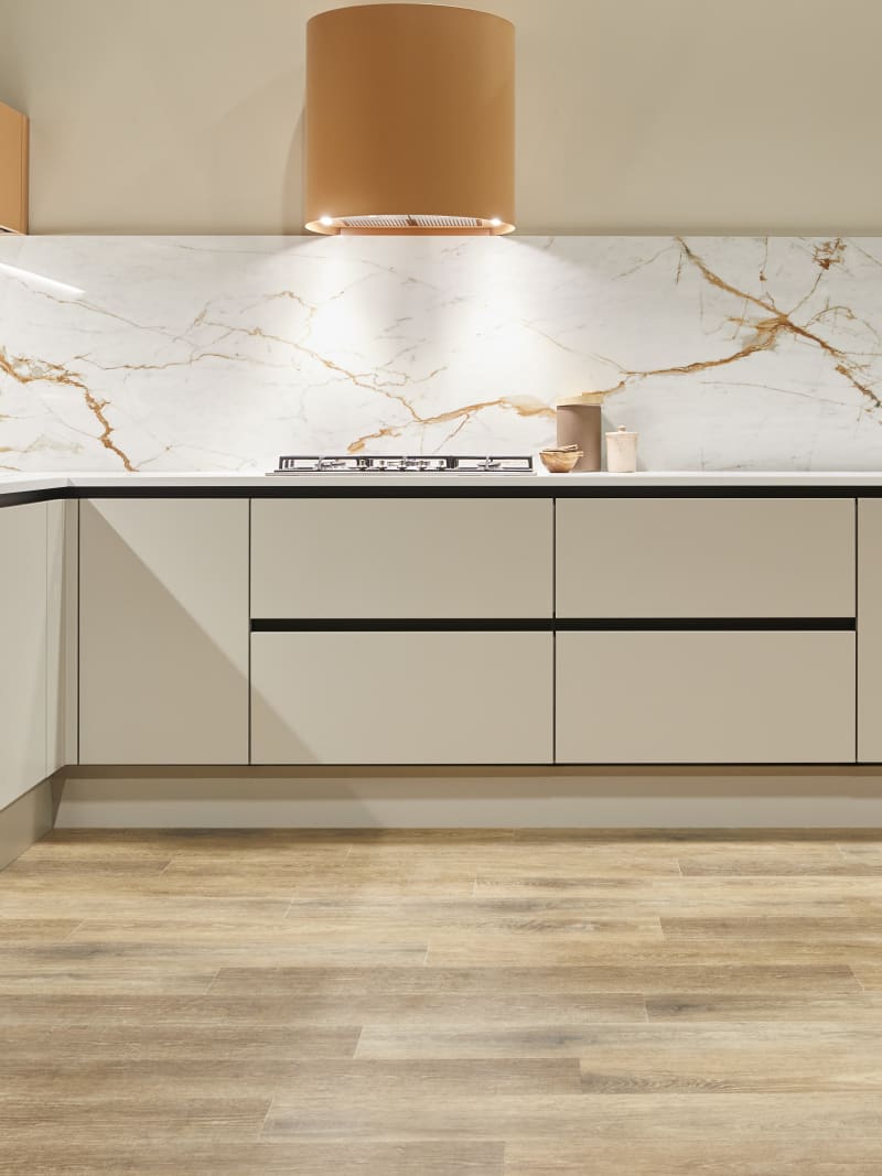 Integra Soho Limestone and Nutmeg is a frameless slab door with integrated handles in a smooth paint finish.