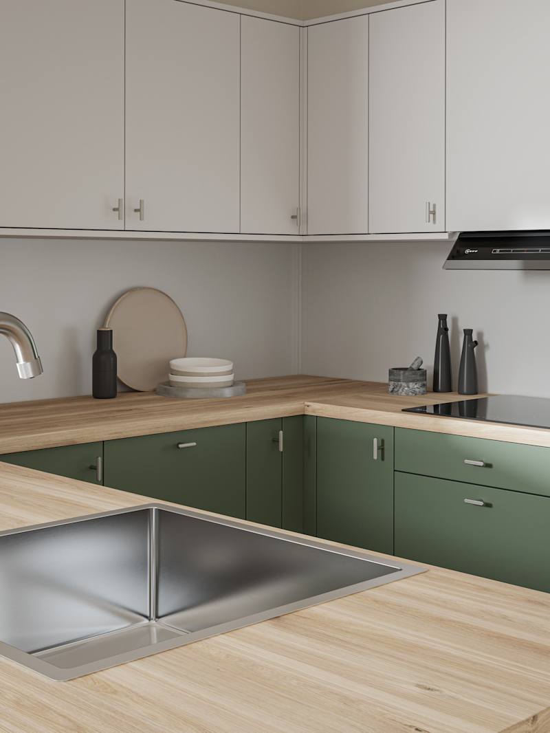 Oak laminate worktop in contemporary scandi influenced Ascoli Woodland and light grey kitchen, with a steel sink and tap and knurled brushed nickel t-bar knobs.