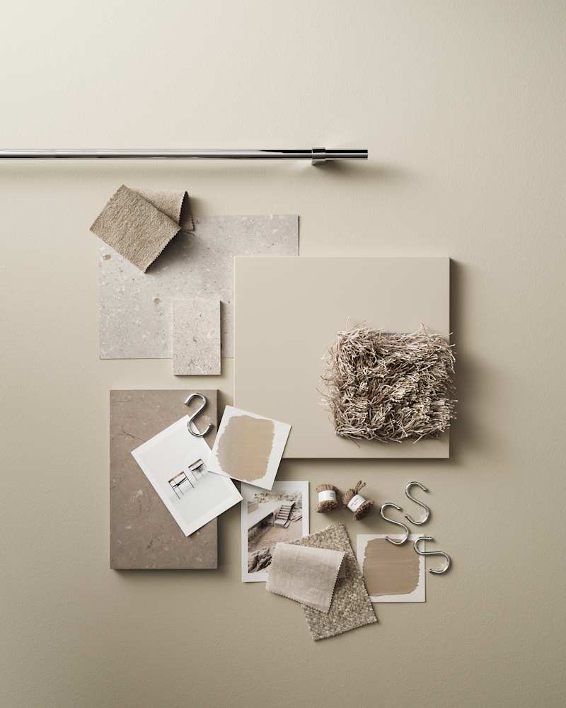 Moodboard med beige slät kökslucka, redskapsstång i rostfritt stål, jute och naturmaterial, grå bänkskiva