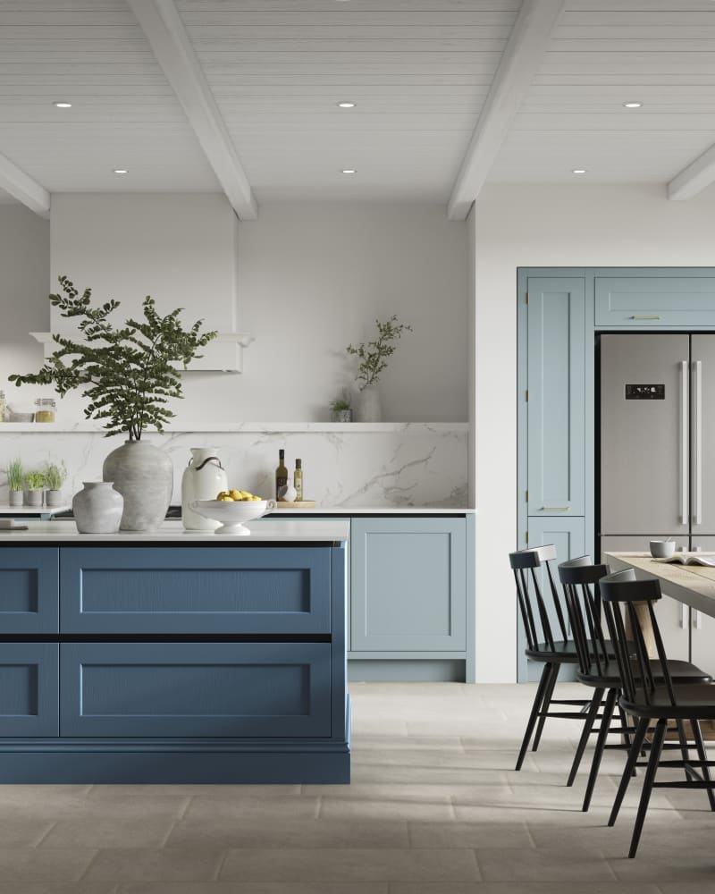 Integra Ludlow in shades Sky and Voyage Blue, a contemporary take on a Shaker kitchen, where the premium frontal features panelled doors with integrated handles.
