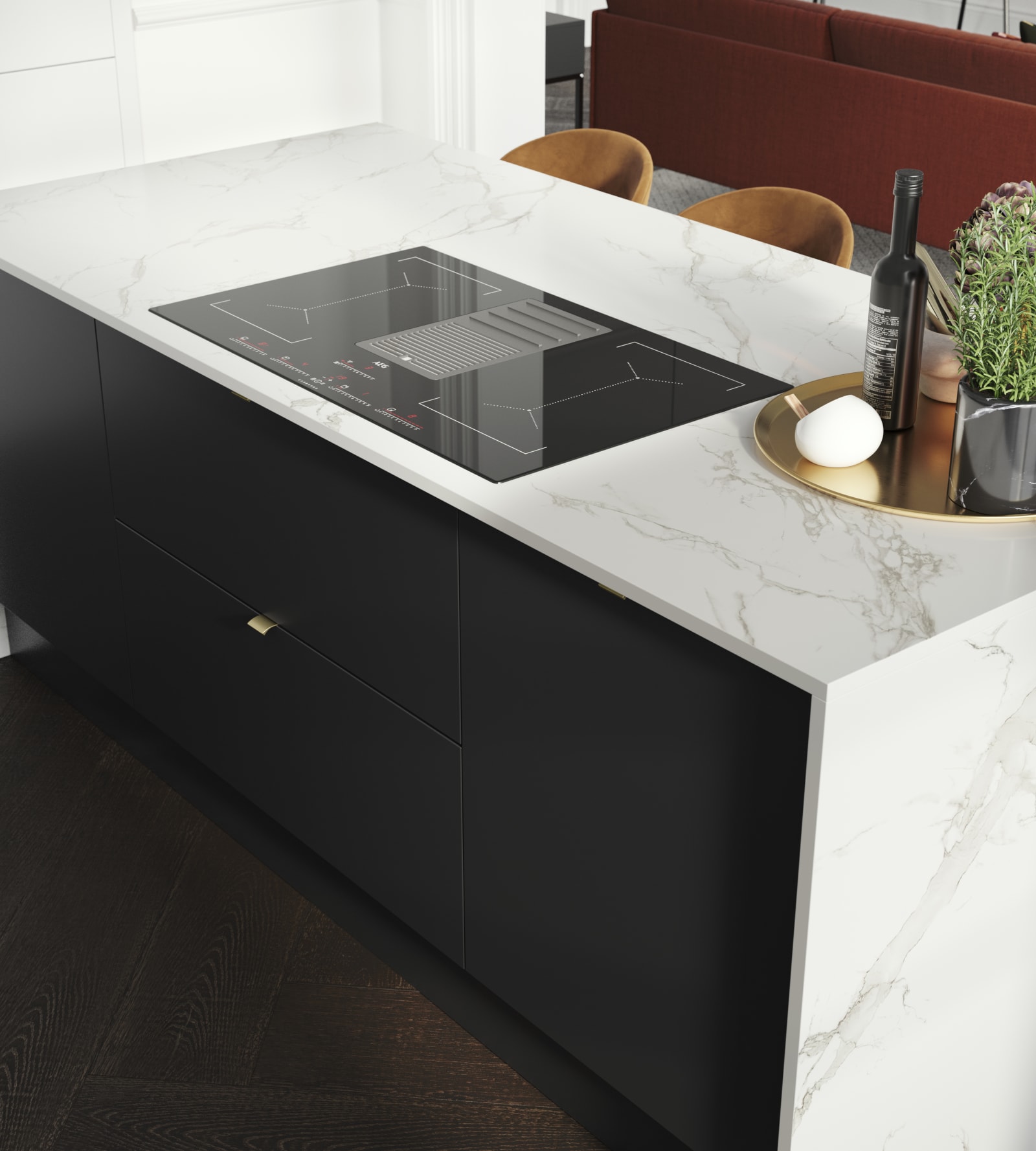 Overhead view of kitchen island, covered with marbled decor side in Magnet's minimal maximalism Hoxton kitchen in Sumi Black.