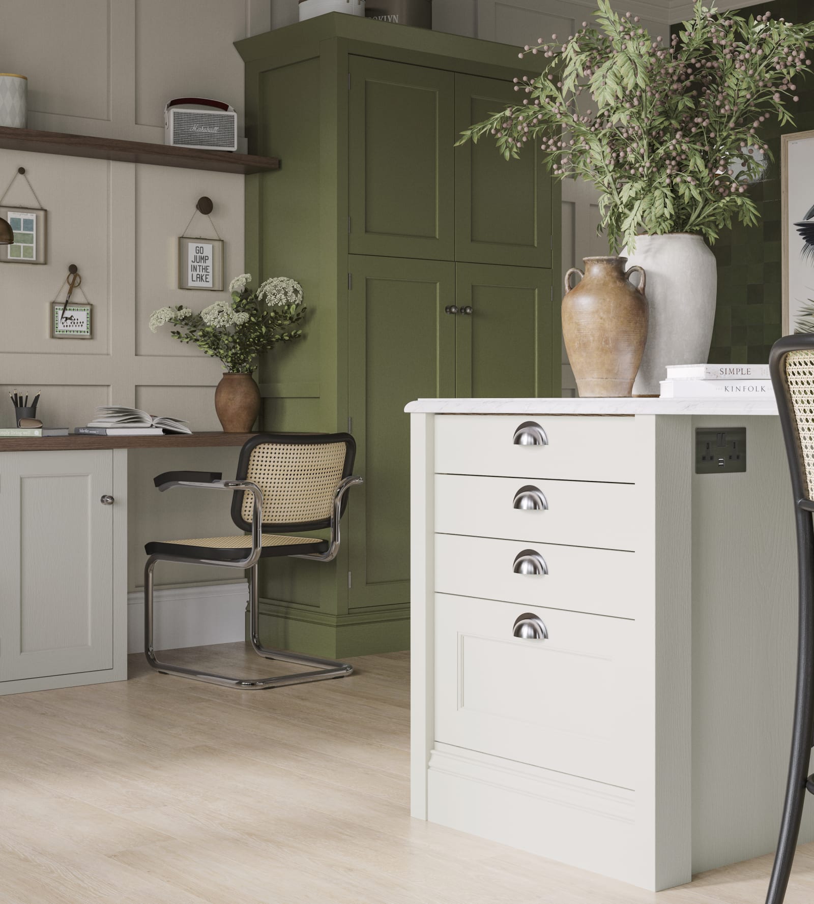 Off-white and olive green kitchen featuring shaker-style cabinetry and a desk area within the space.