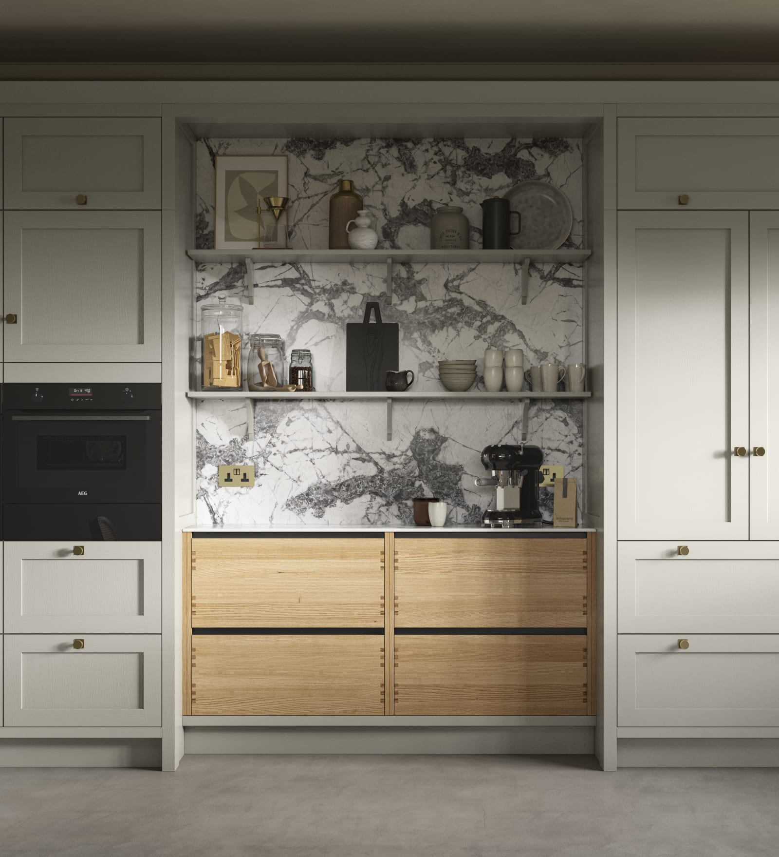 A neutral Shaker kitchen with Pebble and Nordic Craft cabinetry, marble splashback behind open shelves and paired with brass handles.