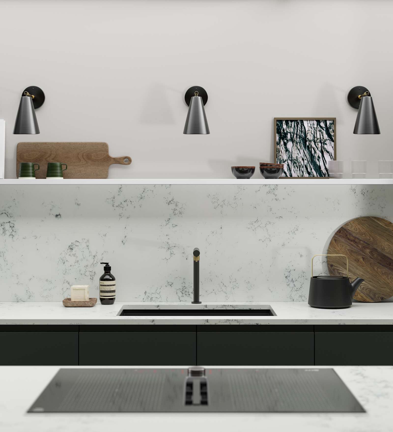 A Duxbury kitchen sink set up featuring marble-effect worktops and backsplash, black sink and tap and open shelving with wall lights and accessories.