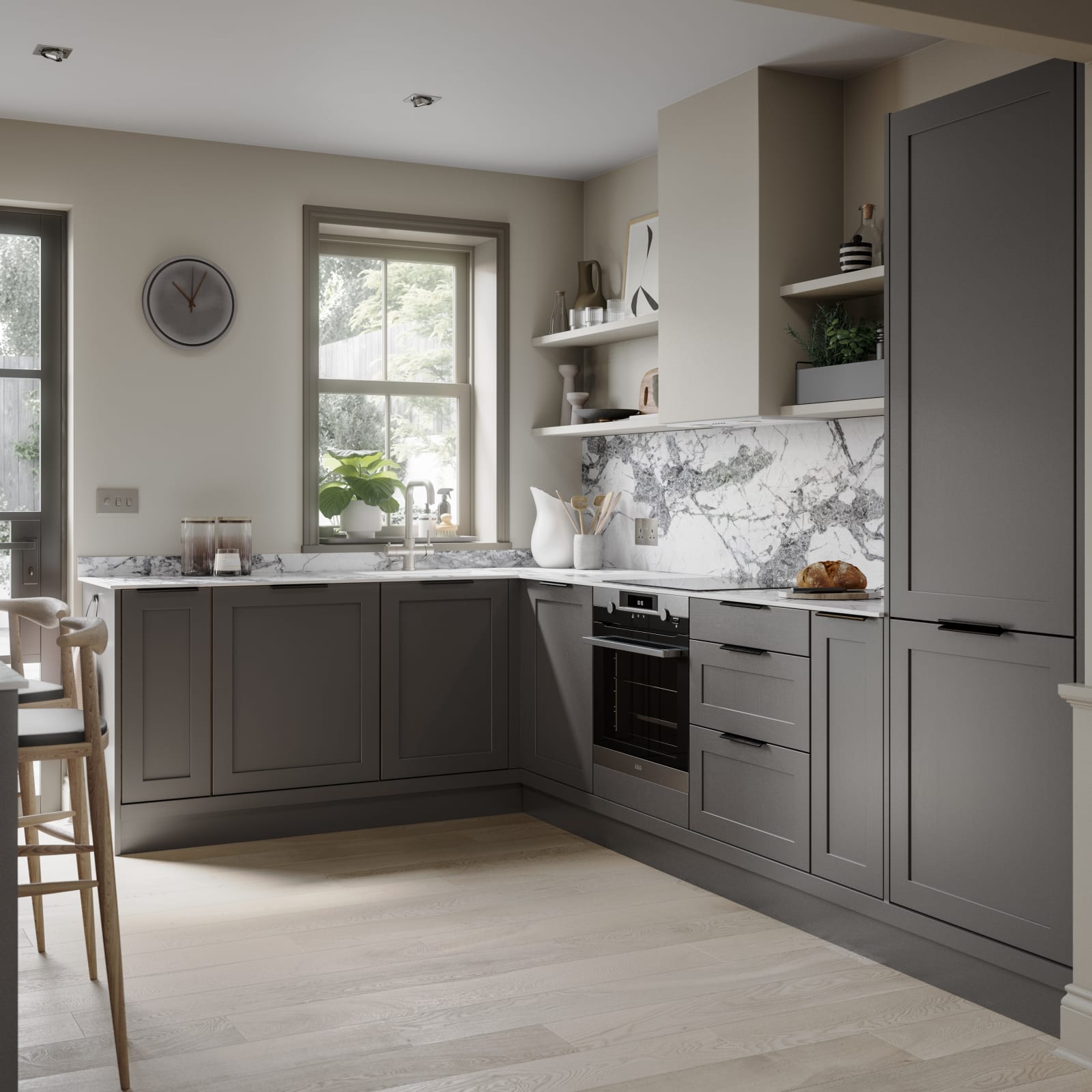 Shaker kitchen in dark grey shade Charcoals, matched with a marble worktop and backsplash.