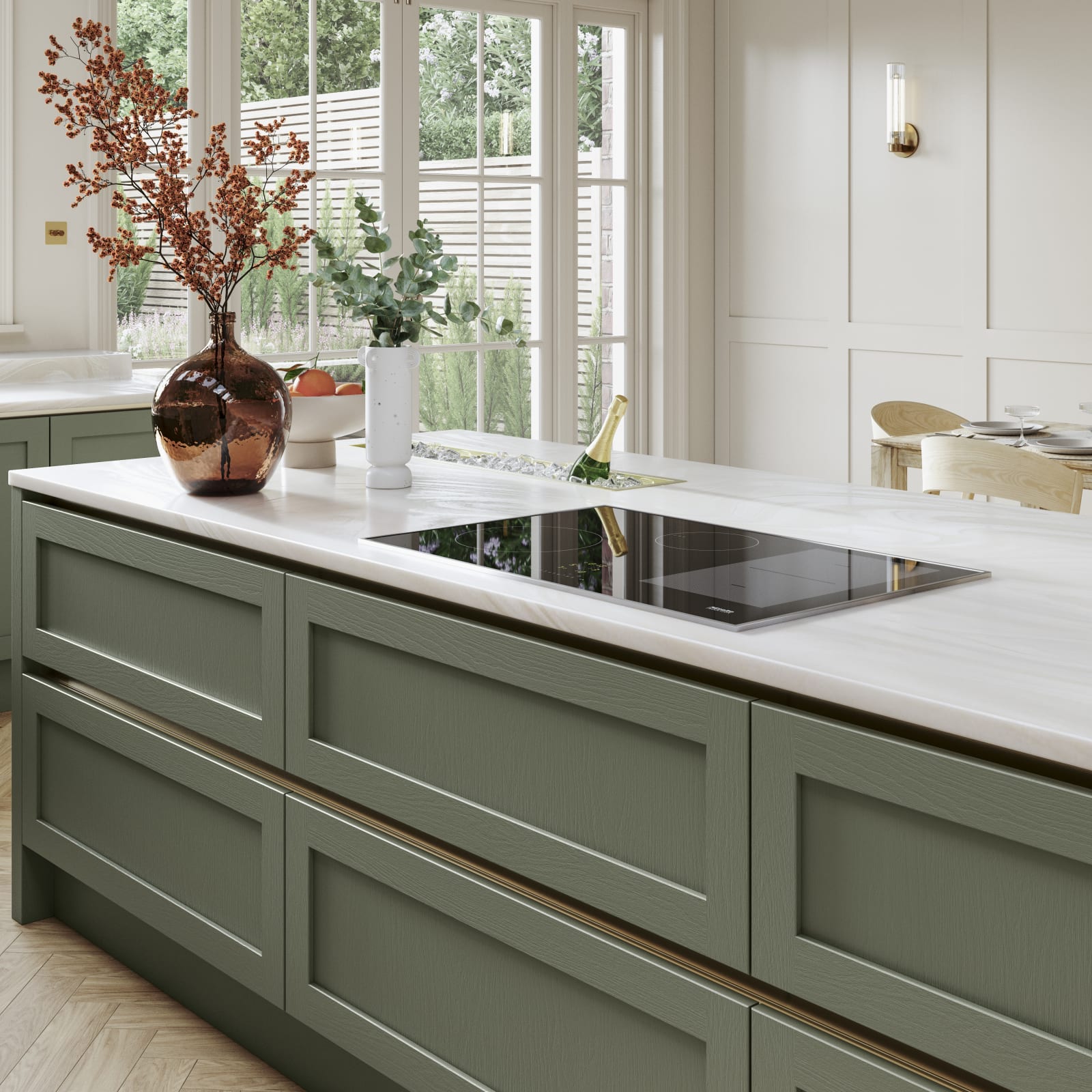 Kitchen island in Integra Wardley shade Misty Moor with narrow framing and integrated handles, on a painted timber finish.