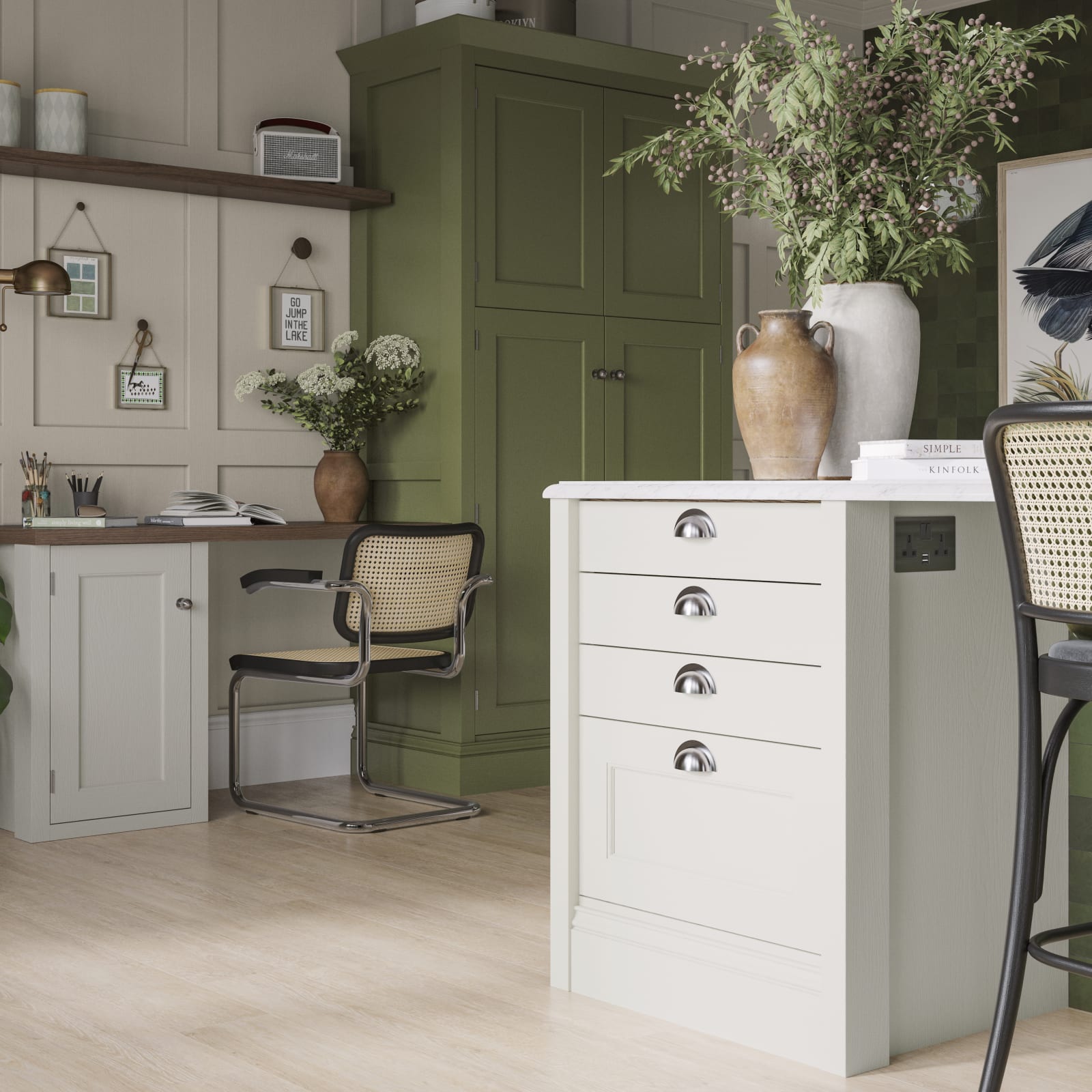 Off-white and olive green kitchen featuring shaker-style cabinetry and a desk area within the space.