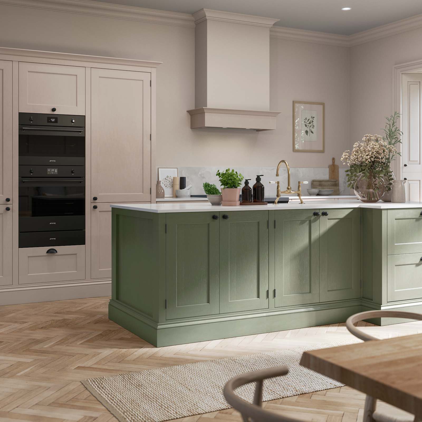 Open layout kitchen, a Thyme shade kitchen island and tall Wardley Shell cabinets with built-in ovens.