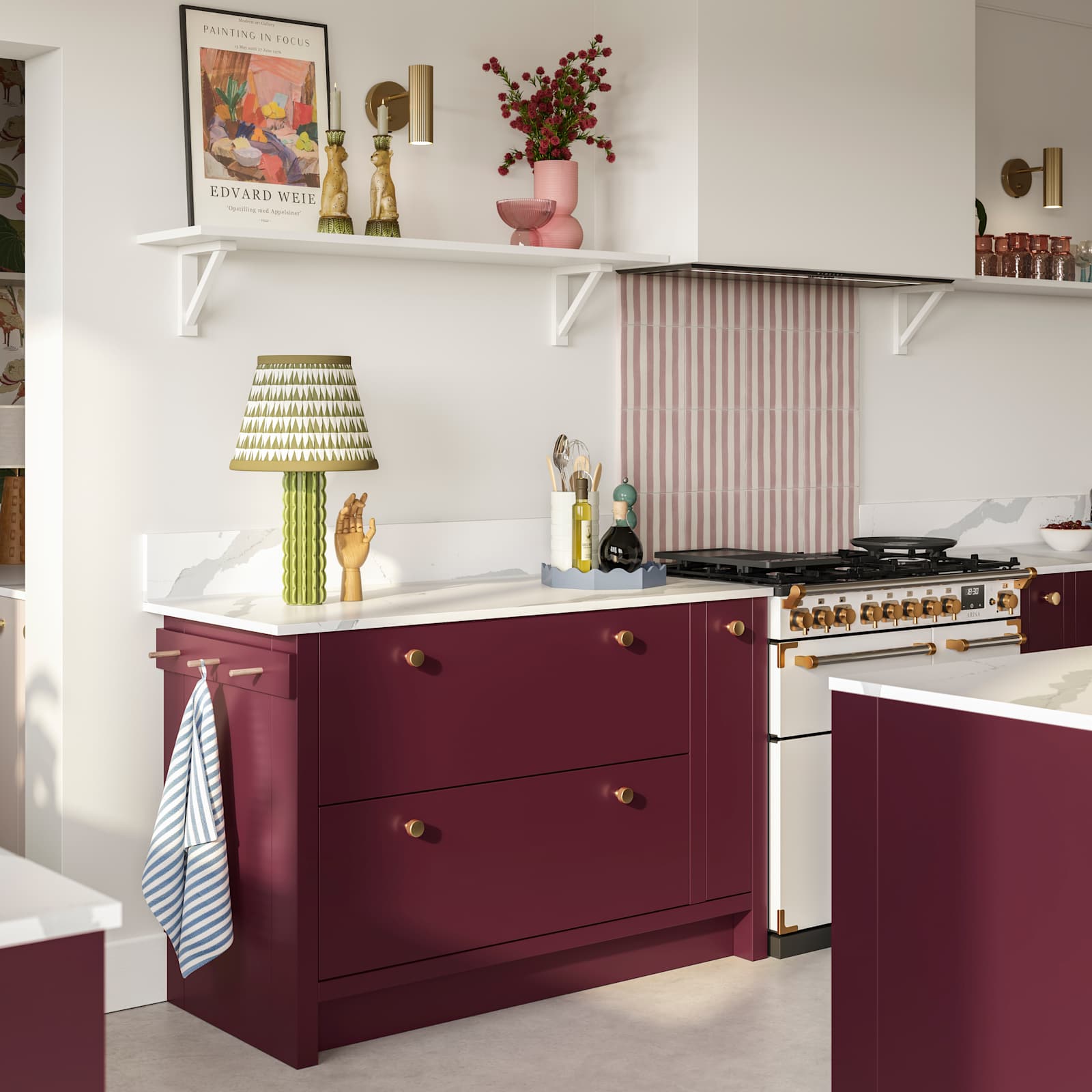 Modern slab front Soho Morello and Shell kitchen with kitchen island, Bianco calacatta worktop and upstand, brass knobs and open wall shelves holding eclectic decorations and glasses.