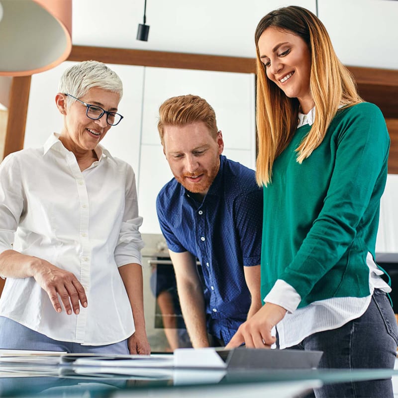 A local expert designer advising their customer on their 360 kitchen design.