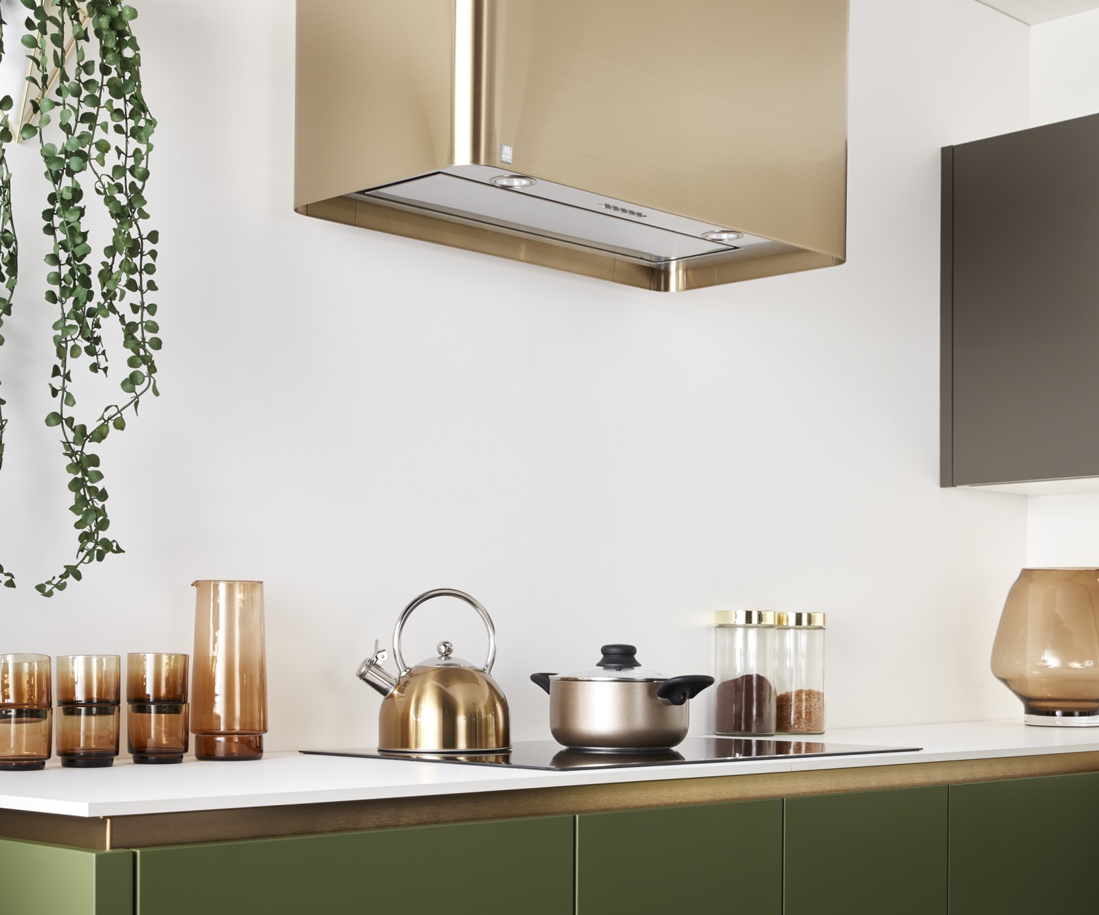 Integra Soho by Magnet. Ultra contemporary dark green kitchen with sleek handless doors and available in 20 different colours.