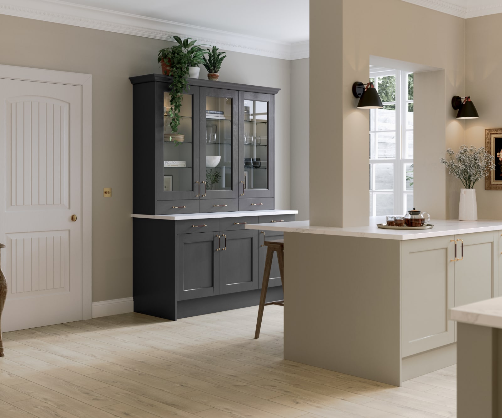 Ludlow kitchen, a Shaker door with a modern country-style in the neutral shade Pebble path paired with dark grey tall glass door display cabinets.