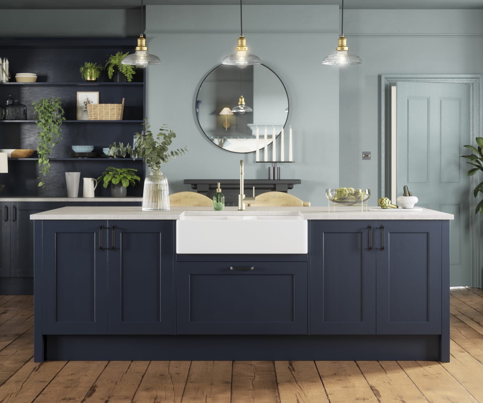 Modern country-style kitchen island with Shaker door Ludlow in dark blue shade Midnight, a porcelain sink, marbled worktop, brass tap and open shelves in matching blue.