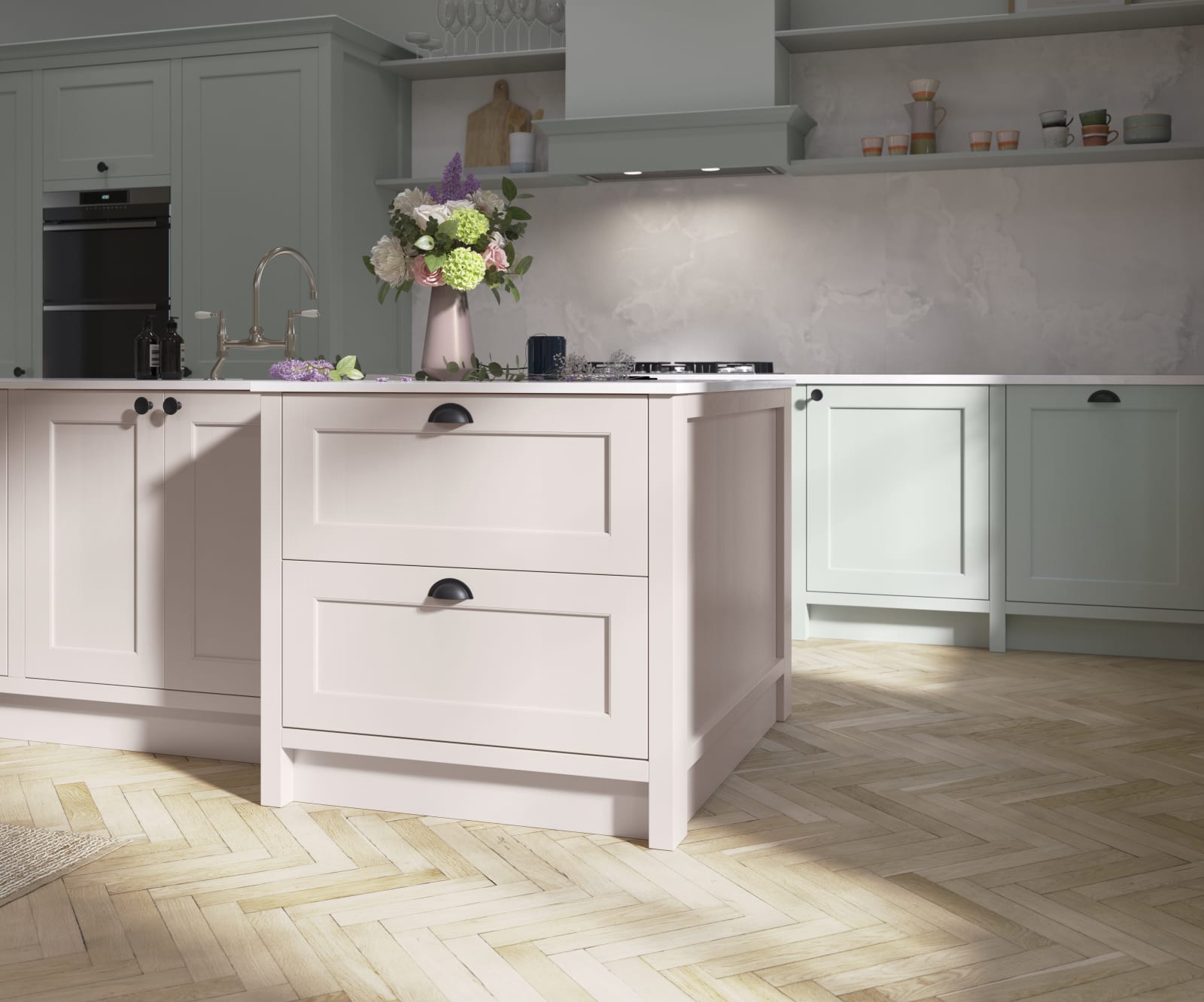 Ludlow, a traditional Shaker-style kitchen range featuring panelled doors with visible woodgrain and beading detail, in the light airy shade Seagrass.