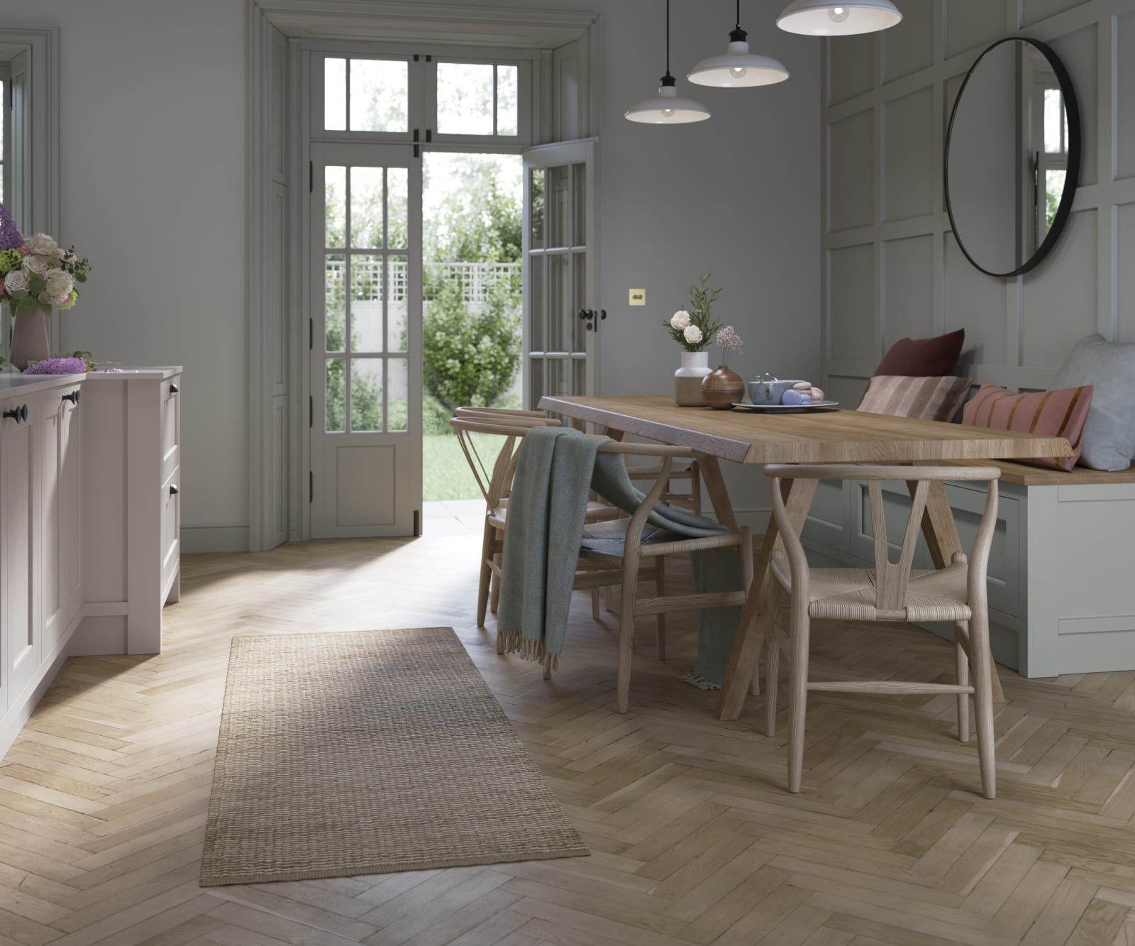 Ludlow, a traditional Shaker-style kitchen range featuring panelled doors with visible woodgrain and beading detail, in the light airy shade Seagrass.